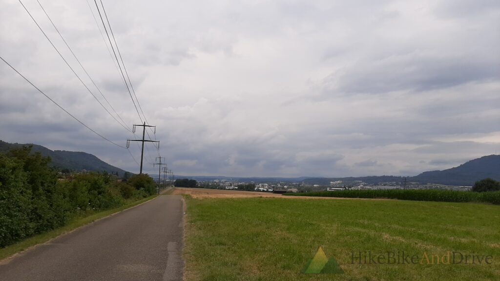 Straight country road through flat farmland towards the Rhine