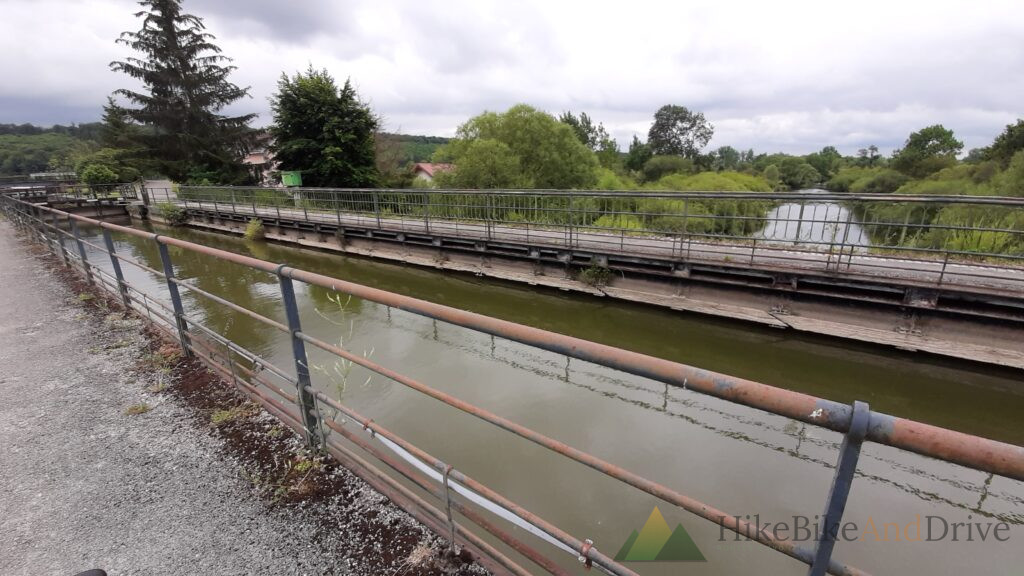 Canal with a railing along the cycle route in Alsace